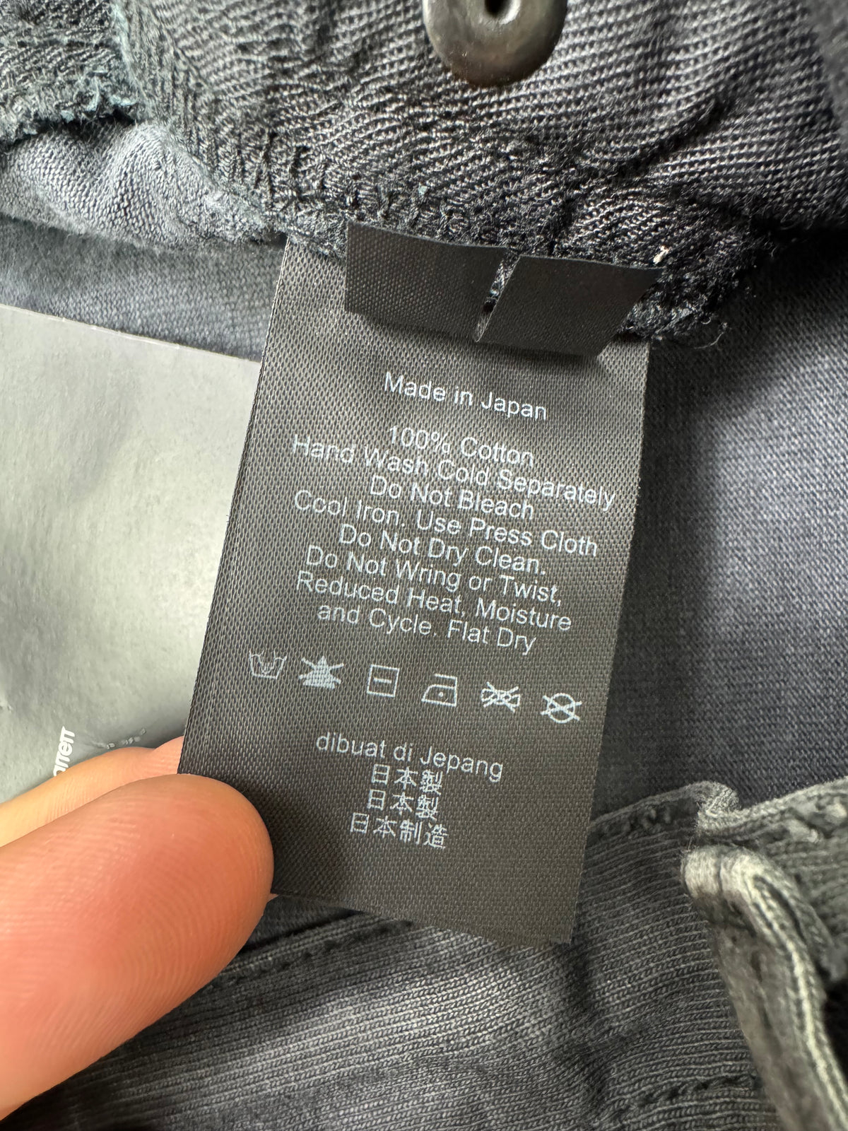 Neil Barrett waxed jeans