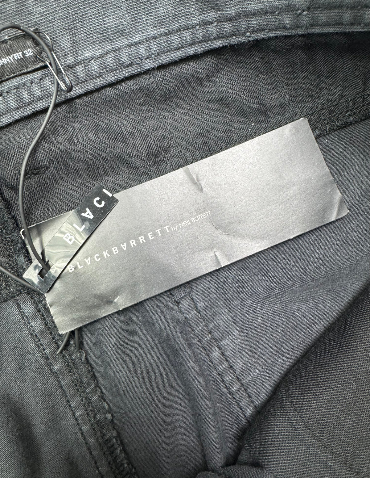 Neil Barrett waxed jeans