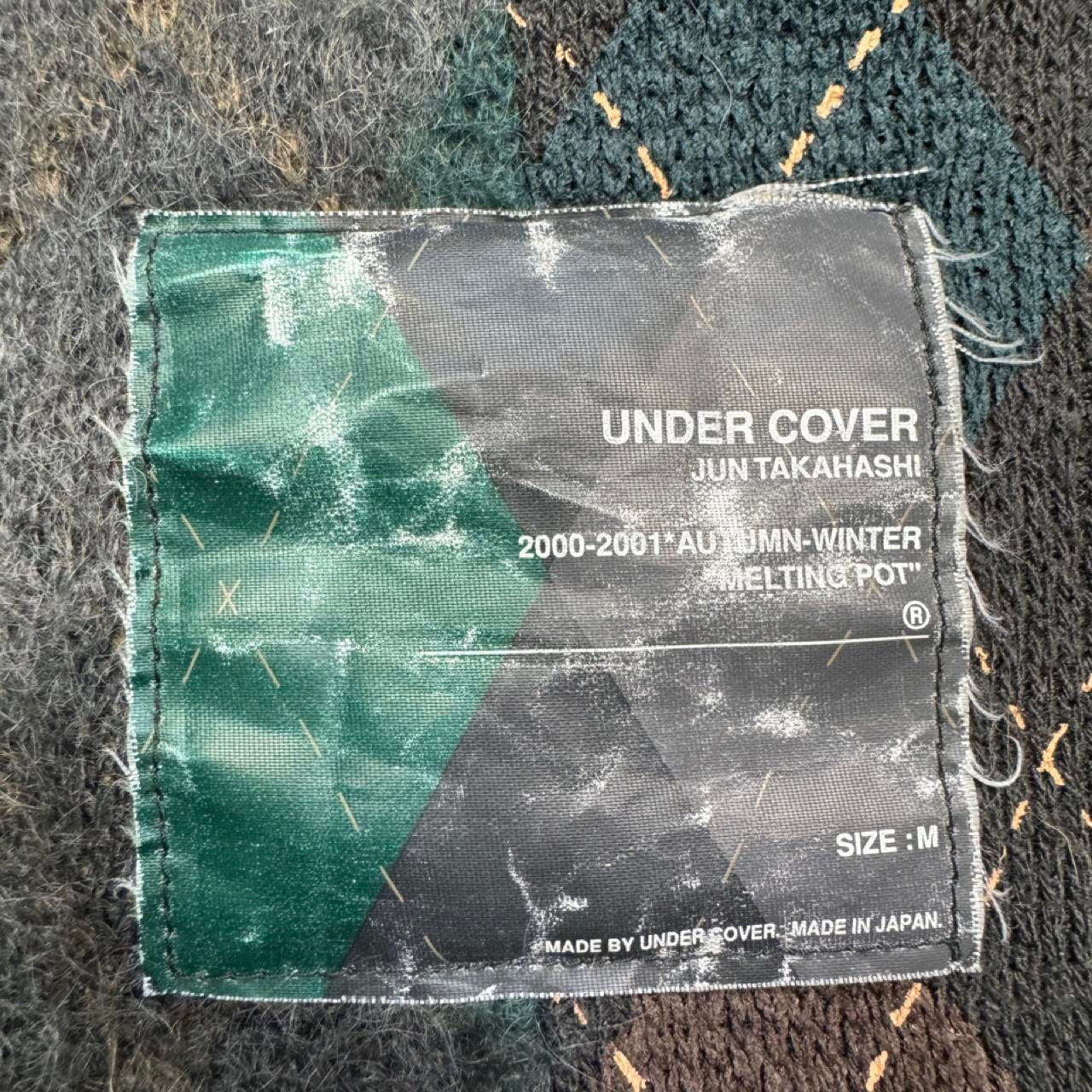 undercover melting pot jumper
